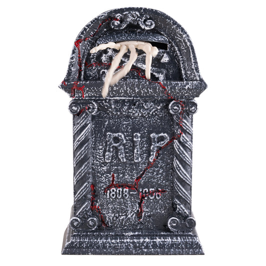 Grabstein mit greifender Skeletthand