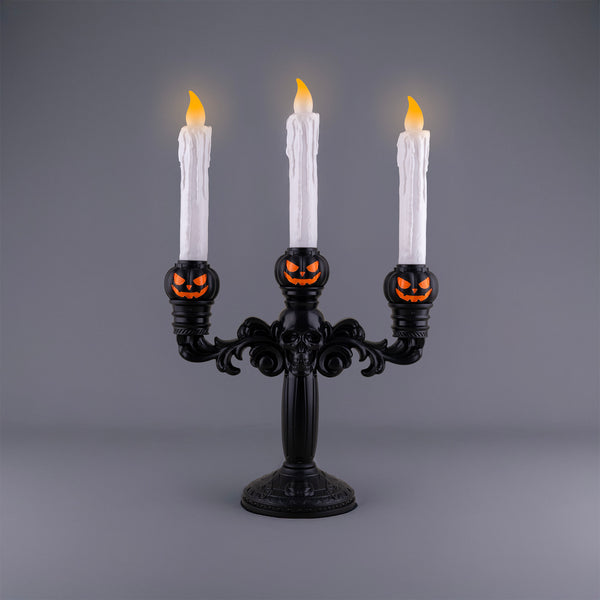 Kürbis-Kerzenständer mit Licht